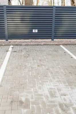 a park bench with the number on it at Pilot Loft in Kaunas