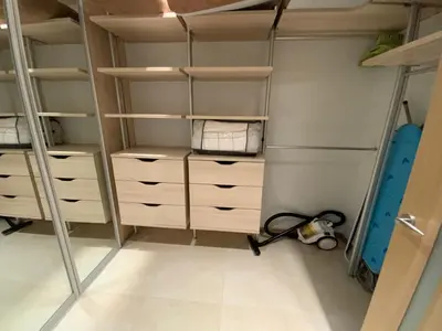 a bedroom with bunk beds and a vacuum at West Side Druskininkai in Druskininkai