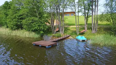 an aerial view of two rafts in the water at Lamėsto Krantas in Saldutiškis