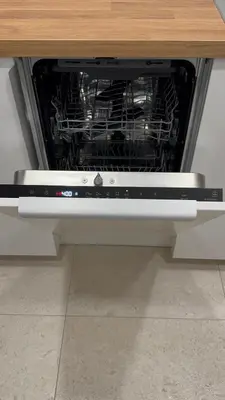 an oven with its door open under a table at Parko rezidencija apartments II - SELF CHECK-IN in Panevėžys