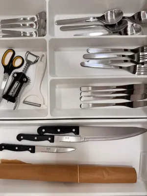 a drawer full of utensils in a refrigerator at Parko rezidencija apartments II - SELF CHECK-IN in Panevėžys