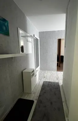 an empty room with a sink and a mirror at Gold & Black in Kėdainiai