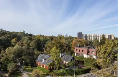 an aerial view of a city with buildings and trees at Apartment with air conditioning in the Center in Druskininkai