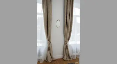 a room with curtains and a window at Cosy Old Vilnius in Vilnius