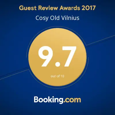 a yellow circle with the words guest review awards costly old virus at Cosy Old Vilnius in Vilnius