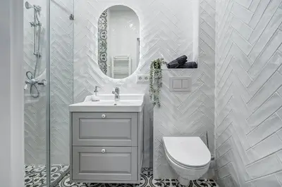 a bathroom with a sink and a toilet and a mirror at Angel House Vilnius, 47 in Vilnius