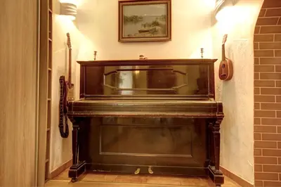 a fireplace in a hallway with a sink above it at Sofijos apartamentai Old Town in Vilnius