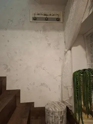 a room with a wall with a sign on it at Šermukšniai in Rokiškis