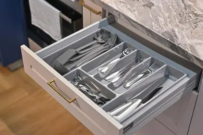 a kitchen drawer with silver utensils in it at Serenity Space in Vilnius by Reside Baltic in Vilnius