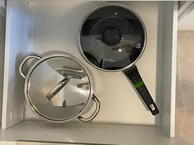 a kitchen appliance with a mirror and a knife at Avia Loft in Kaunas