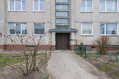a brick building with a door in front of it at Studio apartment Sea by PoloApartments in Kaunas