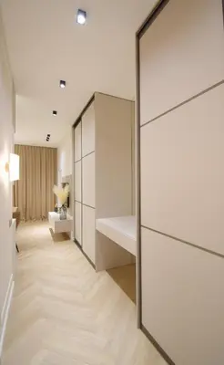 a room with a sliding glass door with a bedroom at Vilniaus 99 Apartamentai in Šiauliai