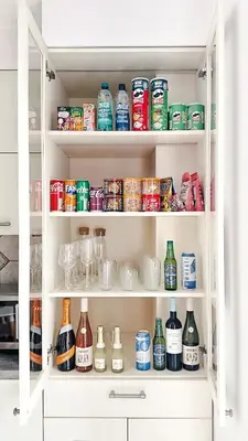 a refrigerator filled with lots of drinks and food at Vincent Heritage Appartments - Near Clinic, Arena and Stadium in Kaunas