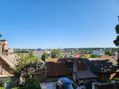 an aerial view of a city with roofs at Panoramic balcony 3BD apt with king bed in Kaunas