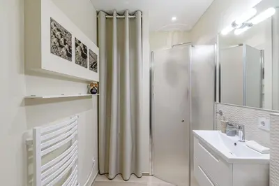 a bathroom with a shower and a sink at City center, studio, 514 in Vilnius