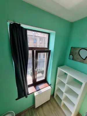 a small room with a window and a shelf at Sauna 5 bedrooms apartment in old town & Parking in Kaunas