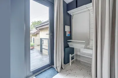 a room with a sliding glass door with a balcony at Vilnius city, 17 FREE Street Parking in Vilnius