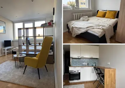 a bedroom and a living room with a bed and a kitchen at Maslow apartments - Self check in in VNO