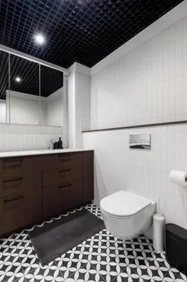 a bathroom with a toilet and a sink at Sunny, Peaceful & Spacious Apartment by URBAN RENT in Vilnius