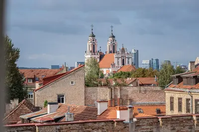 a view of a city with buildings and towers at Timeless Bliss Old Town Apartment by Reside Baltic in Vilnius