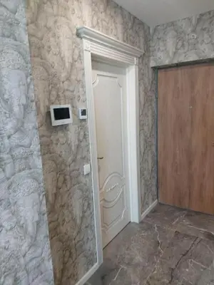 a room with a door and a wall at Gilužio Apartments in Vilnius