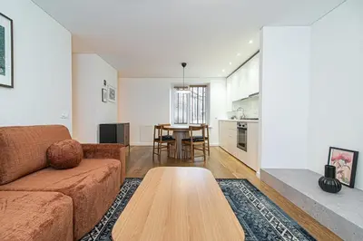 a living room with a couch and a table at Stylish & Comfortable 1-Bedroom Apartment in Vilnius Old Town by URBAN RENT in Vilnius