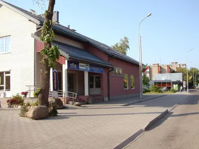 a building on the side of a street at Eiva in Marijampolė