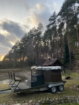 a cabin on the back of a trailer at Dzūkų sodžius in Snaigupė