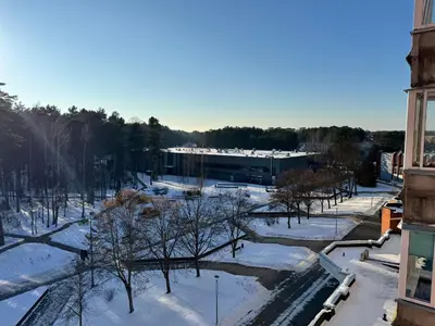 an aerial view of a building in the snow at AUKŠTAS Ap in Visaginas