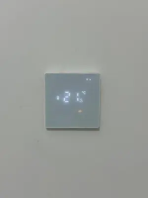 a white object on a white wall in a room at Užupio apartamentai Nemokamas parkingas in Vilnius