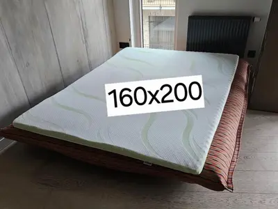 a mattress with a sign on top of it at Happy Inn VIP Lounge, self check-in, parking in Vilnius