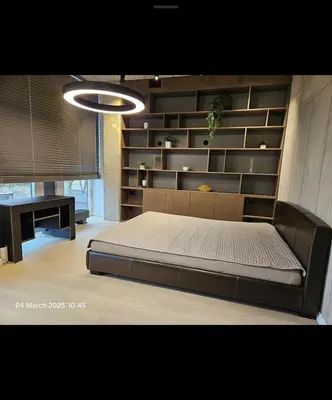 a bedroom with a bed and a desk in it at Happy Inn VIP Lounge, self check-in, parking in Vilnius