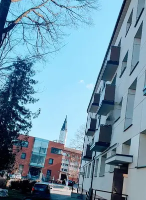 a view of a building in a city at SUN CITY Varpo Apartment in Šiauliai