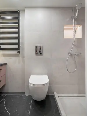 a bathroom with a toilet and a shower at Pinky loft in City centre Self check-in No 3 in Vilnius