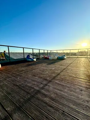 a pier with several boats on the beach at City Center Panoramic Penthouse With Rooftop Terrace - Self Check-in in Vilnius