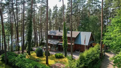 an aerial view of a house in the woods at Villa Emerald in Luokesos Sen