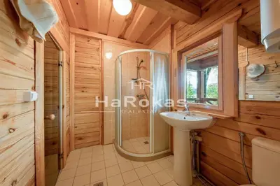 a bathroom with a shower and a sink at Villa Emerald in Luokesos Sen