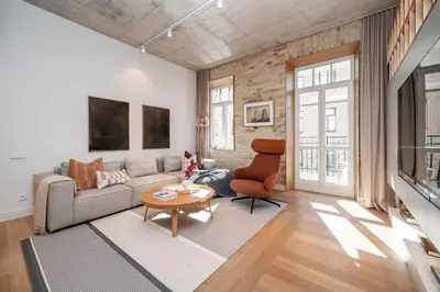 a living room with a couch and a table at 2 Bedroom I 85 m2 I w-Balcony I Malunu st Apt I cohost in Vilnius