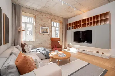a living room with a couch and a tv at 2 Bedroom I 85 m2 I w-Balcony I Malunu st Apt I cohost in Vilnius
