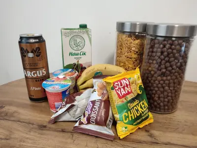a table with some food and two cups of food at ShortStopStudent in Vilnius