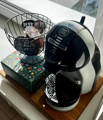 a black and white coffee maker sitting on a counter at Letastay in Trakai