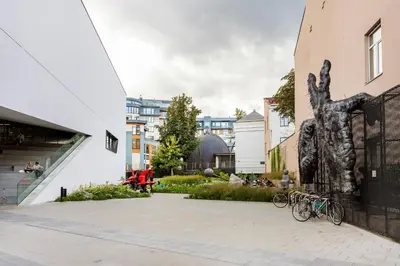 a group of bikes parked next to a building at Old city gate in Vilnius