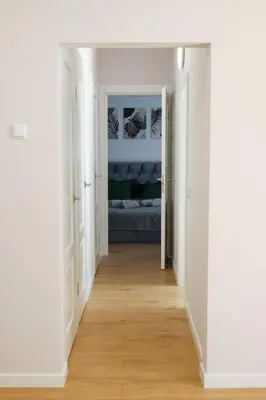 an empty hallway with a bed in a bedroom at Gero laiko oazė in Visaginas