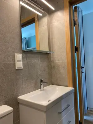a bathroom with a sink and a mirror at 