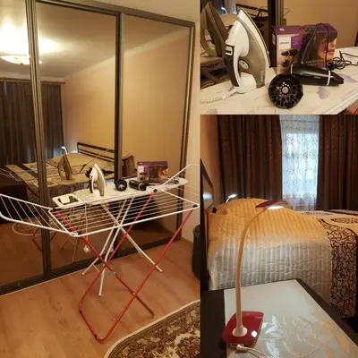 a room with a mirror and a bed with a dressing table at Comfy Bright Apt in OLD TOWN Your Perfect Location in Vilnius