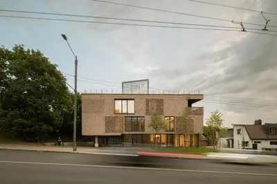 a building on the side of a street at Cosy hill in Kaunas