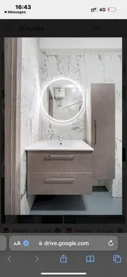 a bathroom with a mirror and a sink at Flat-studija in Vilnius