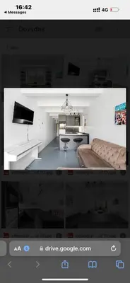 a picture of a living room with a couch at Flat-studija in Vilnius