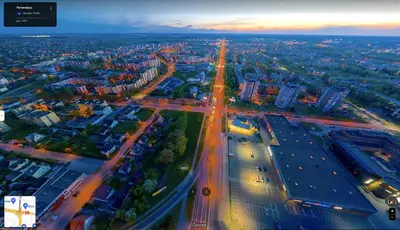 an aerial view of a city at night at Guest House Kamara in Panevėžys