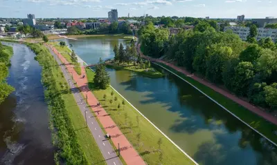 an aerial view of a river in a city at ----------------------------- Via Baltica Panevezys in Panevėžys